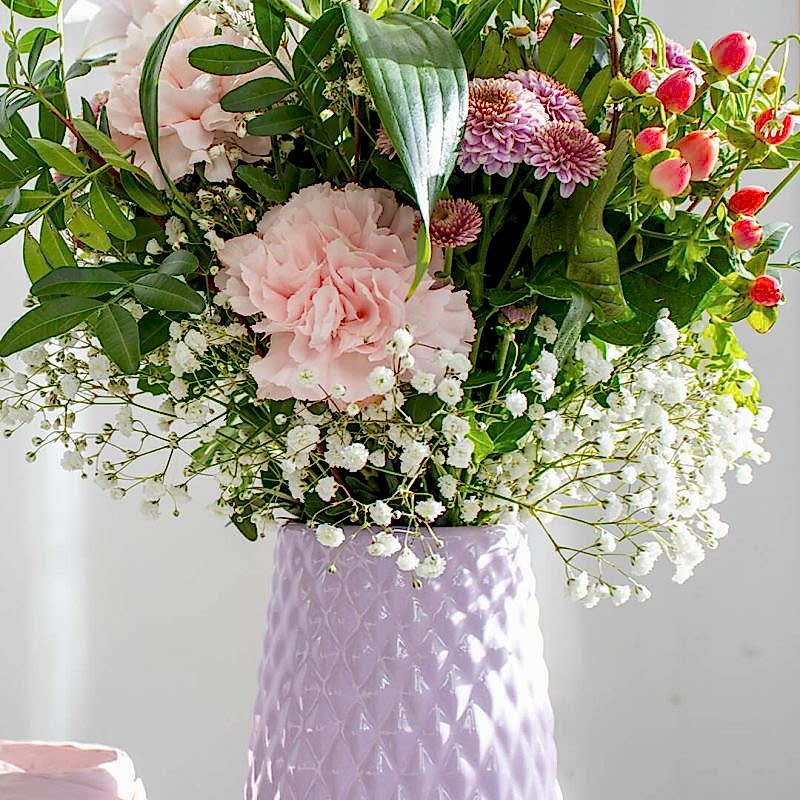 Detalle de Ramo de flores en tonos rosas